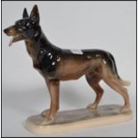 A German Hertwig ceramic figurine of German shephe