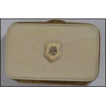 A vintage 19th century ivory and gilt metal purse
