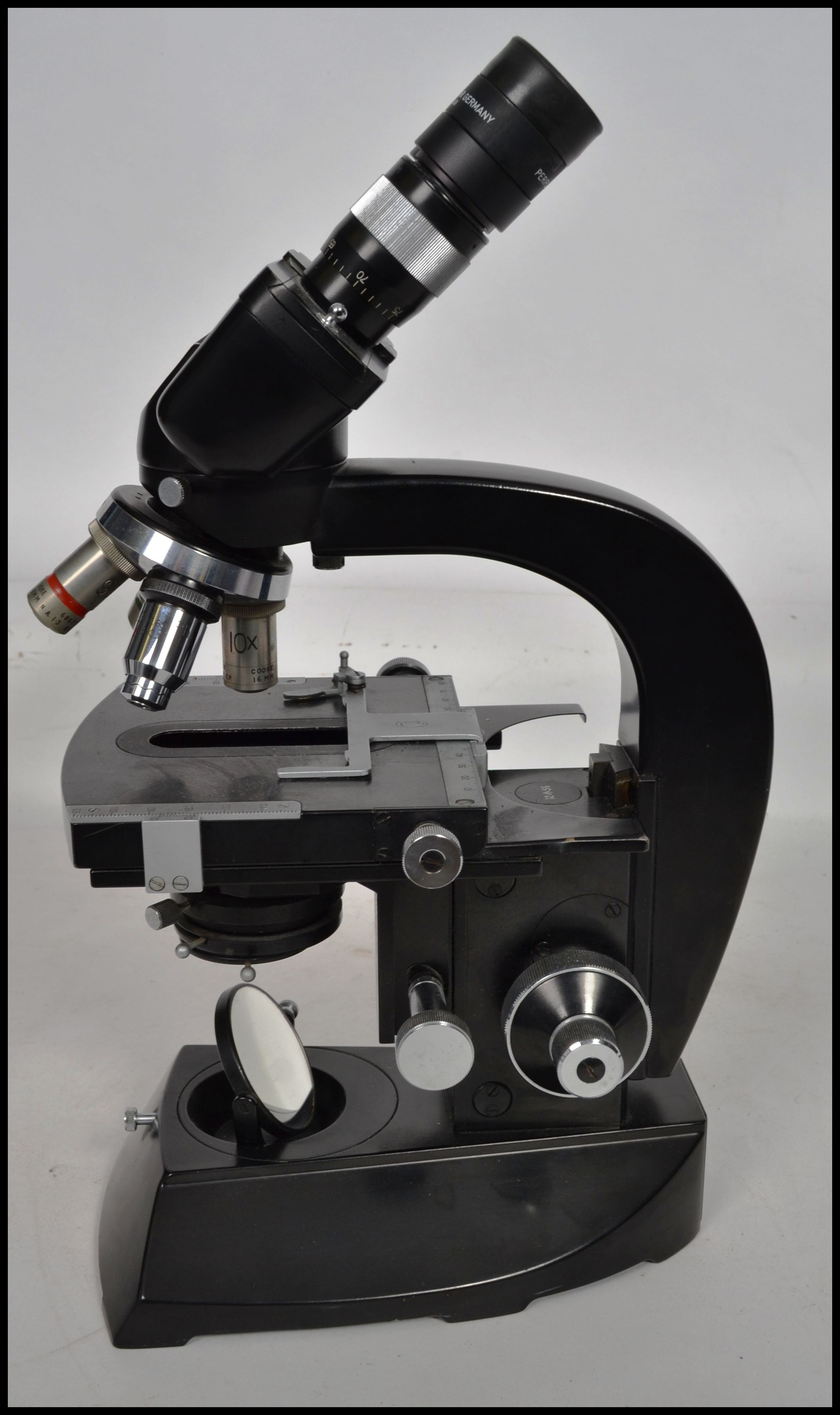 A Ernst Leitz Wetzlar Binocular Microscope,having