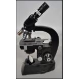 A Ernst Leitz Wetzlar Binocular Microscope,having