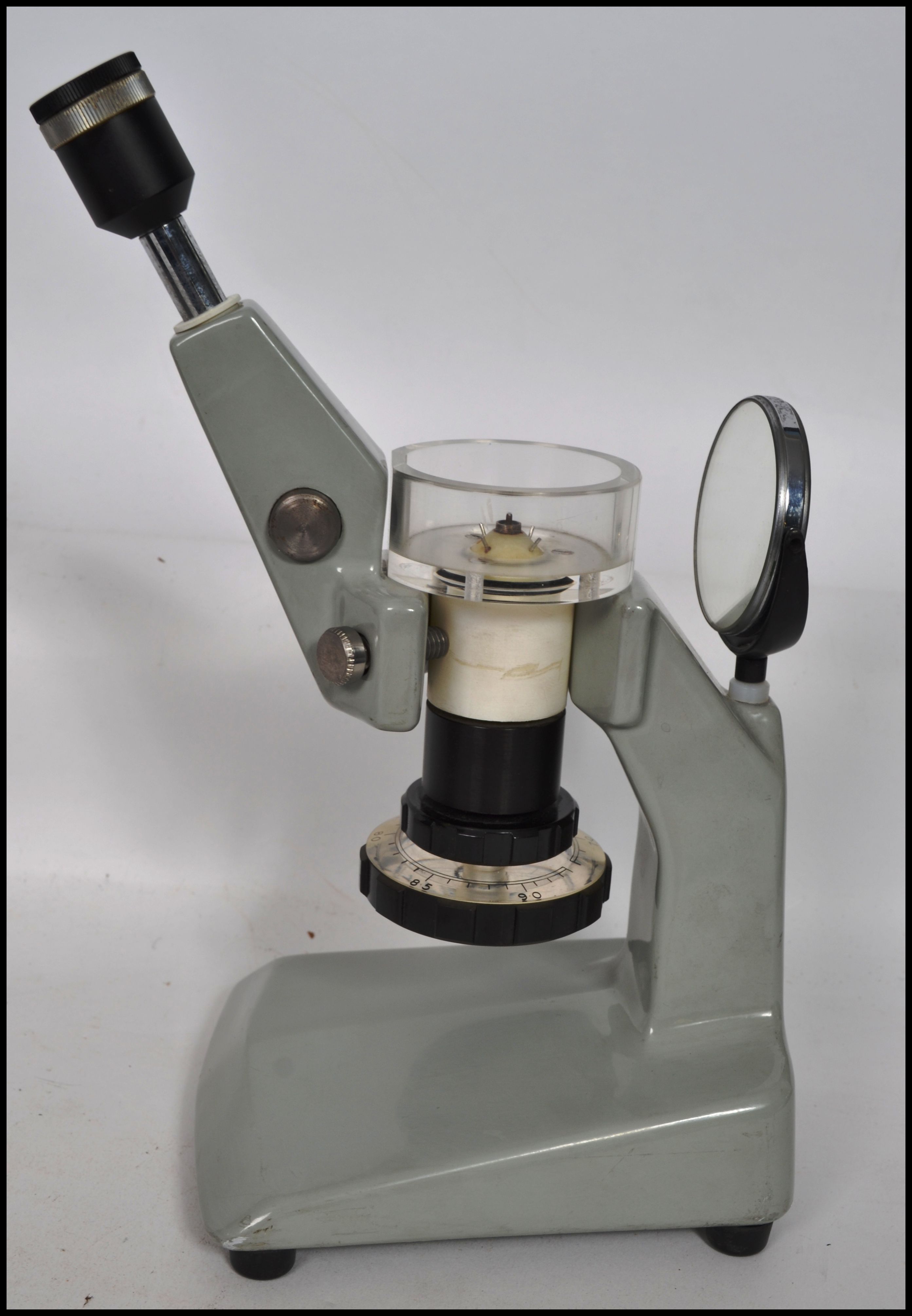 A vintage 20th century microscope with three objec - Image 4 of 8