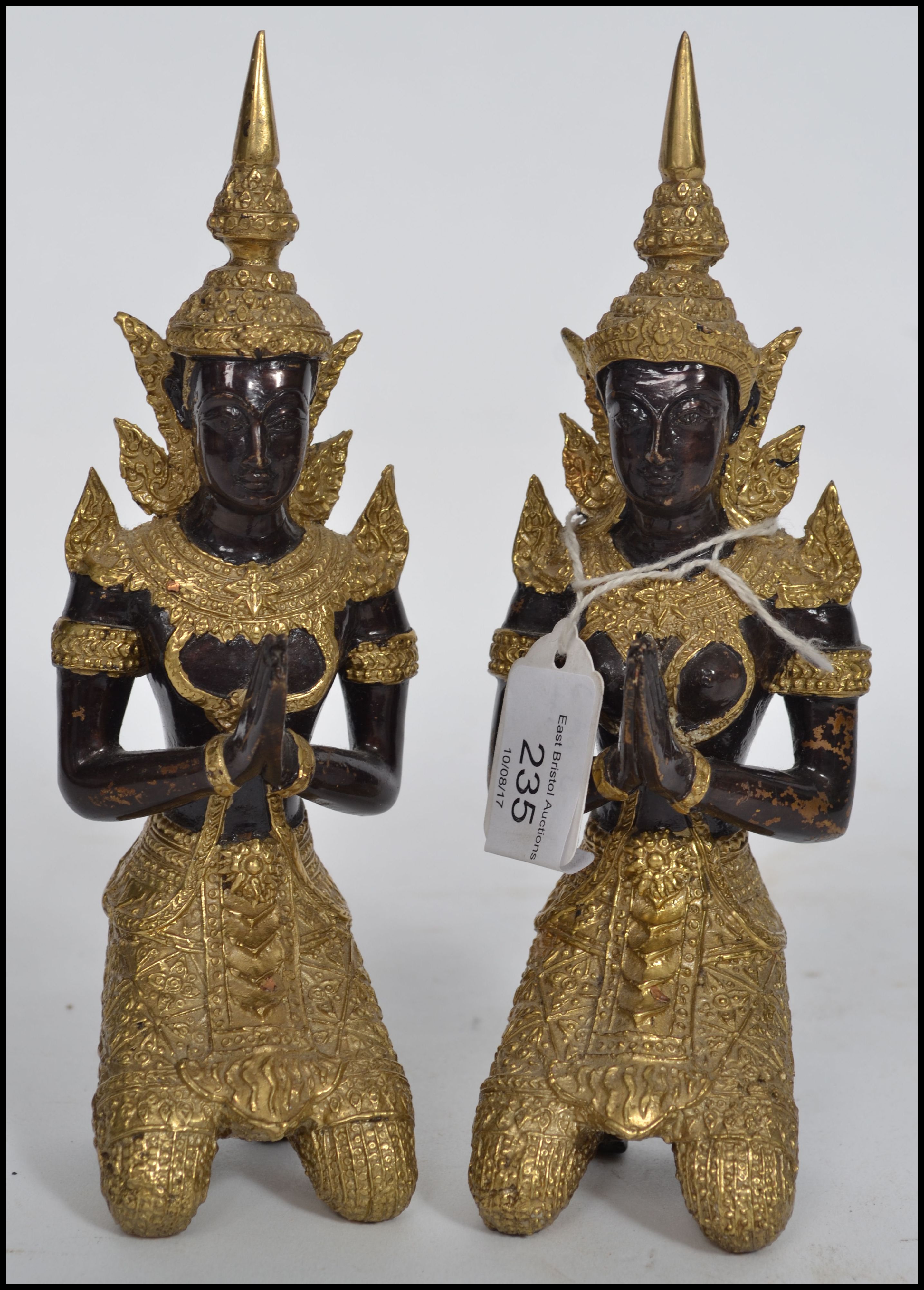 A pair of cold painted and gilded brass / bronze h