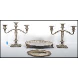 A collection of silver plate to include Mappin & Webb table candelabra along with good quality