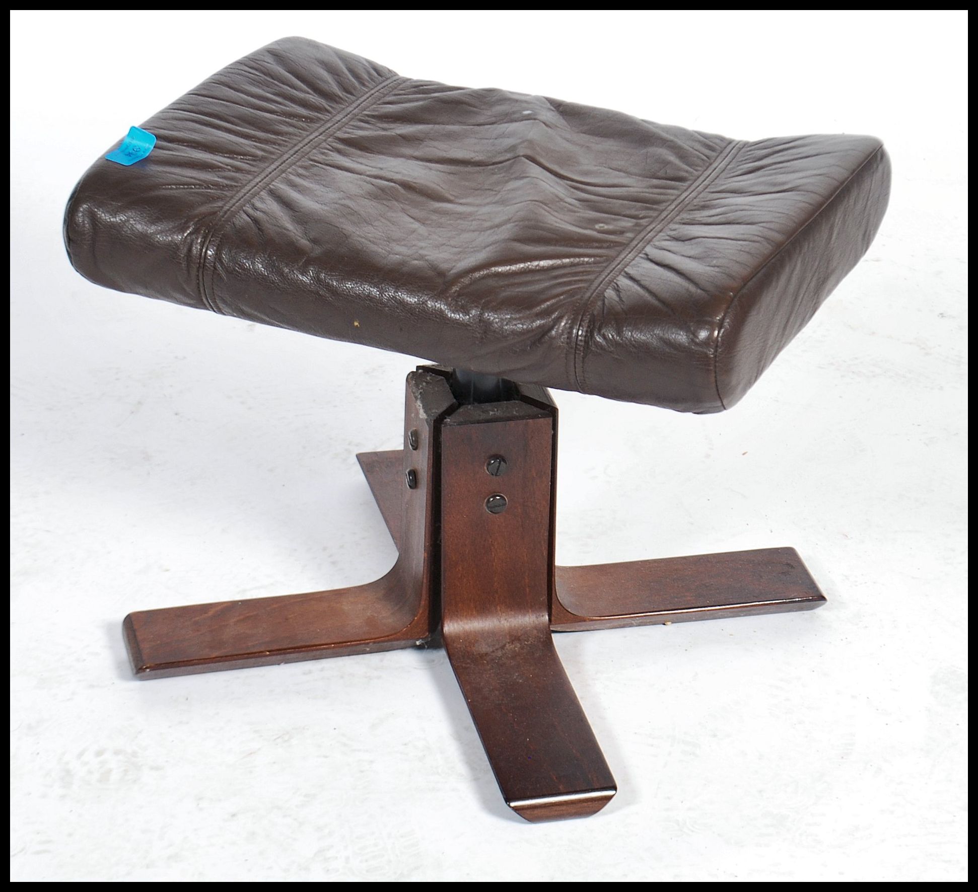 A 1970 Kebe leather footstool / ottoman on a wooden 4 point splayed base. Measures 38cms x 37cms x - Image 2 of 4