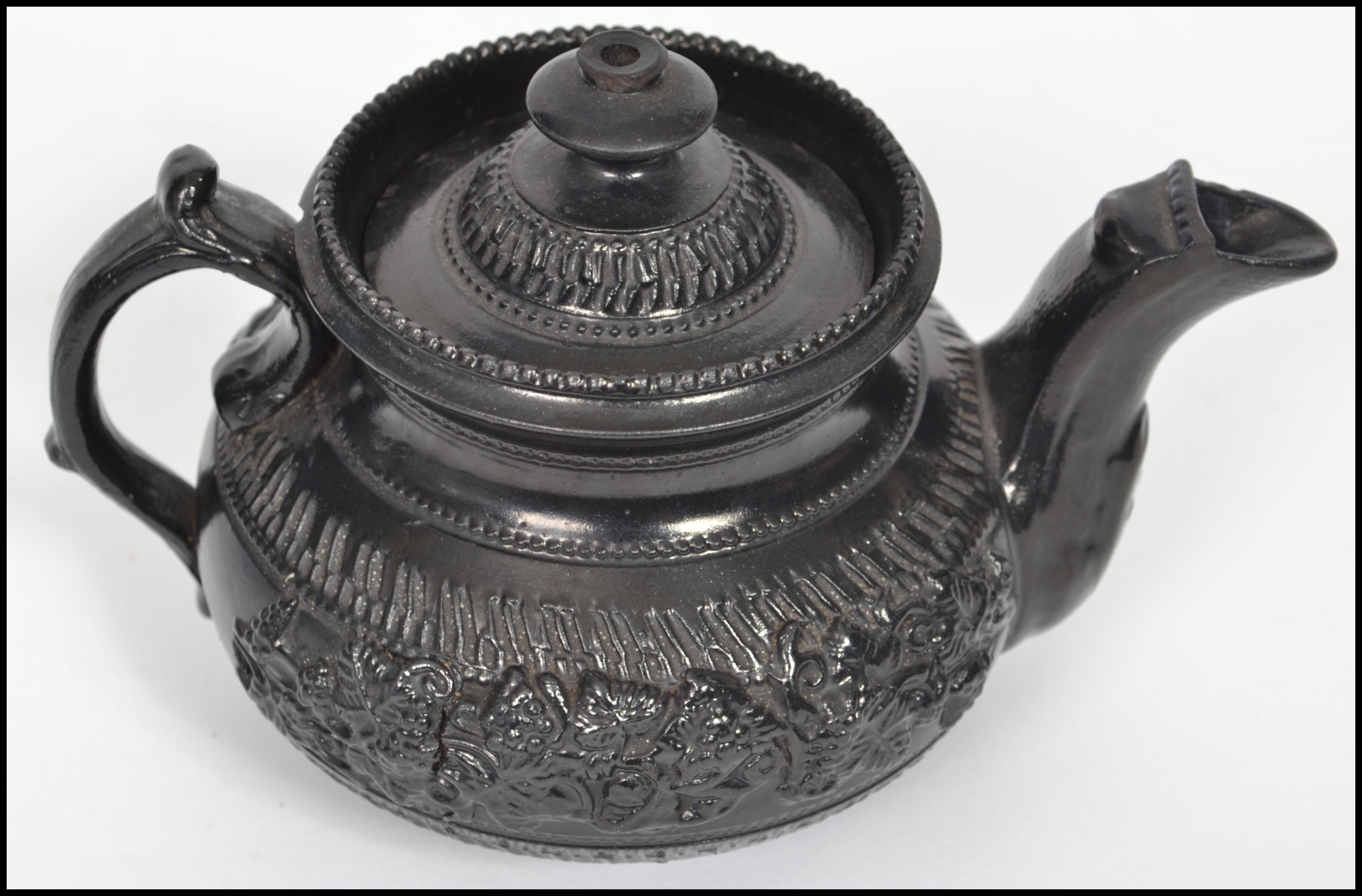 A possibly Wedgwood 19th century Victorian black basalt caneware (cane wear) ceramic teapot of - Image 3 of 5