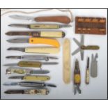 A collection of 14 vintage pens knives along with a Whist marker and an ivorine knife sharpener.