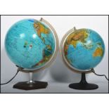 A retro 1970's Danish made Scan Globe terrestrial illuminated globe, supported by a chrome jibb on a