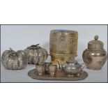 A collection of indian silver plated wares to include caddy, liqueur shot set with tray, cylindrical