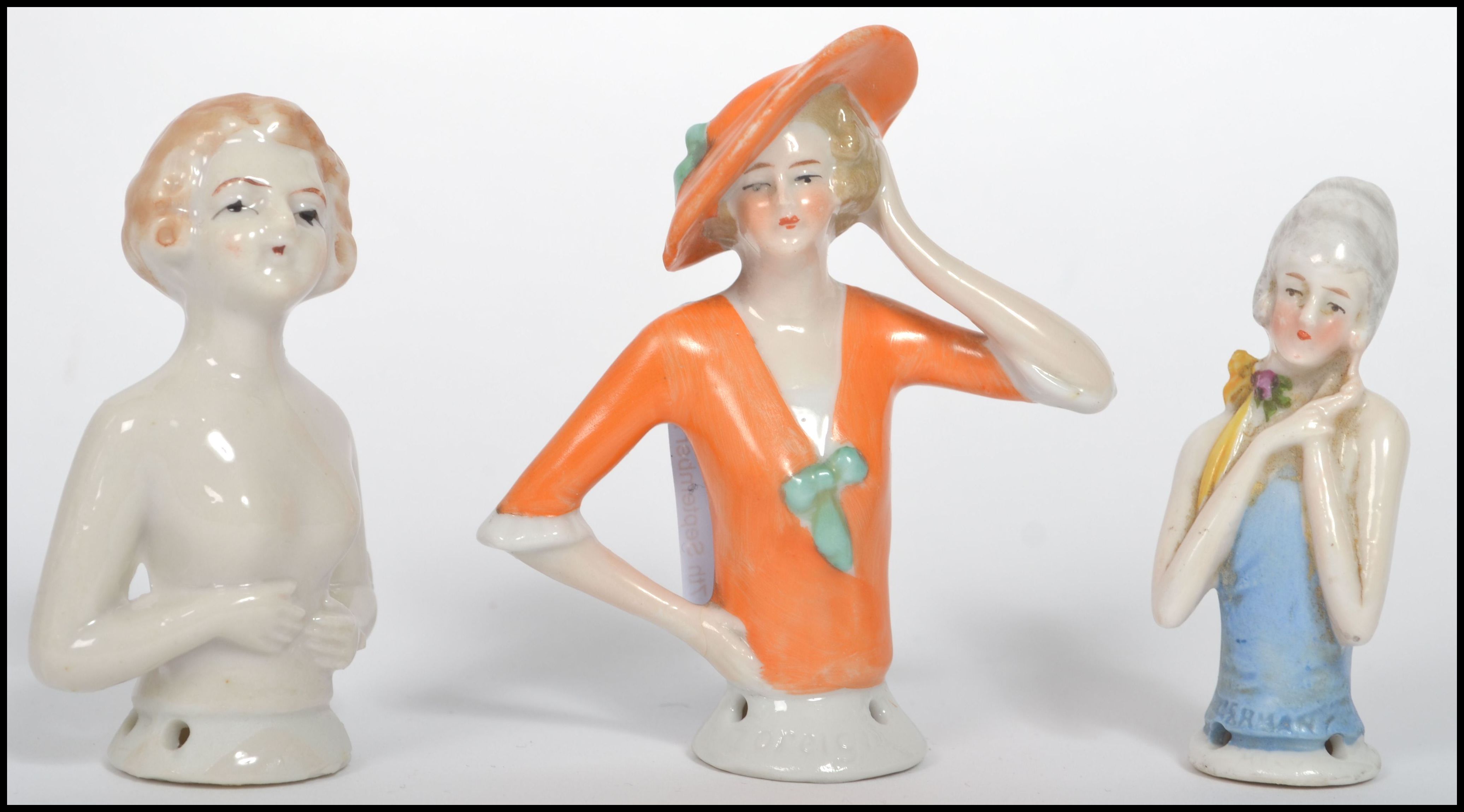 A group of three early 20th century possibly German or Austrian bisque ceramic figures in the female