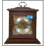 A vintage 20th century Metamec wooden cased mantle clock having a gilt back plate and spandrels,