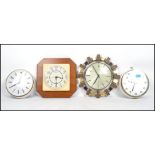 A collection of vintage 20th century retro clocks to include a Metamec Aztec clock, Motif, and two