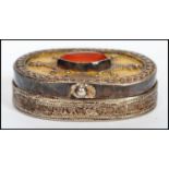 A vintage Kazakhstan silver gilt and Carnelian snuff box from Russian central Asia, fitted with a