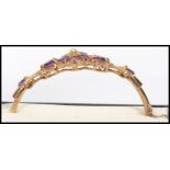 A stunning 20th century ladies 9ct gold, amethyst and seed pearl ladies 9ct gold bracelet.