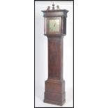 An 18th century oak brass faced longcase clock by Daniel Dalton of Church Lawford. The hood with