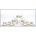 A vintage 20th century Wedgwood ceramic coffee service decorated in the Strawberry Hill pattern