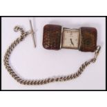 An early 20th Century Movado Chronometre Ermeto silver cased and faux leather vest or purse watch,