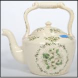 A large 20th century ceramic cream glaze cauldron kettle of Staffordshire origin with lid and a