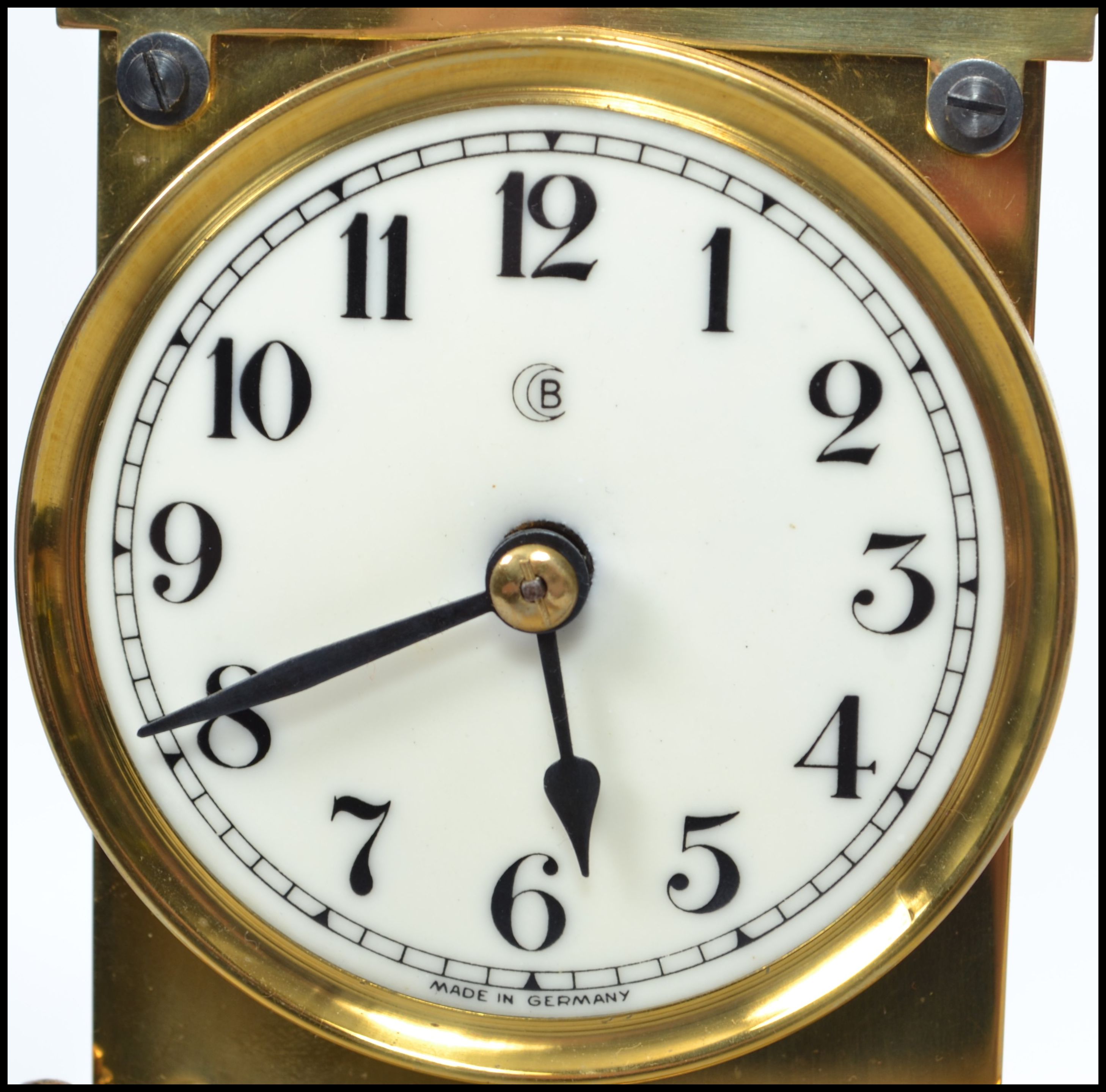 A 20th century glass domed brass anniversary clock raised on a stepped circular base with twin - Image 4 of 4