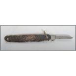 A vintage 20th century silver hallmarked pen knife having a fitted stainless steel blade, assay