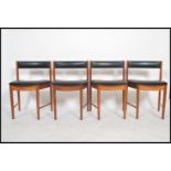 A set of four retro mid 20th century teak wood Macintosh dining chairs in the manner of Frem Rojle