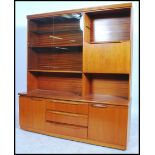 A 1970's teak wood bow fronted Danish influence hi