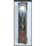 A good 1920's large Westminster chiming longcase clock with large silvered dial over glass window