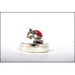 An unusual 20th century silver pill box of shaped form adorned with a mouse pin cushion to the