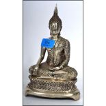 An Oriental believed 19th / early 20th century silver white metal Buddha Bodhisattva in the lotus
