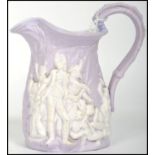 Nelson interest - A 19th century lilac ground ceramic cream jug embossed with scenes of probably the