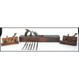 A group of vintage 20th century woodworking planes to include a rebate plane, a plough plane with