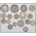 A good group of Victorian and other pre decimal silver coins to include an 1895 Queen Victoria