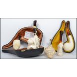 A collection of Meerschaum Pipes to include carved naked female with silver 925 collar ( cased ),