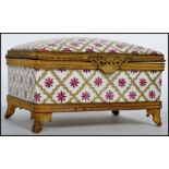 A stunning 19th century ceramic and ormolu jewellery casket, fitted with a hinged lid and raised