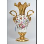 An early 19th century English porcelain twin handled vase, circa 1840, decorated with hand