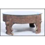 A 19th century rustic up cycled coffee table. Constructed from an Asian flour  / grain mill,