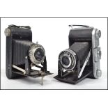 A vintage Ensign  Ranger Special bellows camera with Ensar lens together with a Kodak brownie camera