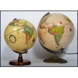 Two vintage 20th century desktop globes one being an antique style Heritage example and the other