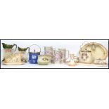 A collection of Cranford Ware ivory blush ceramics to include cheese dish, dressing table set,