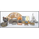 A collection of mainly dressing table items to include Art Nouveau lidded pots, a stunning powder