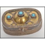 A vintage Kazakhstan silver gilt and Carnelian snuff box from Russian central Asia, fitted with a