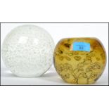 Two large 20th century studio art glass bubble control paperweight dumps.