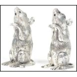 A good pair of continental silver 800 marked table condiments, each in the form of mice  ( see