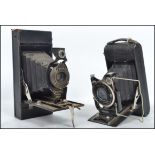 A vintage Zeiss Ikon bellows camera with Carl Zeiss lens Tessar 1:4.5 together with a Kodak No2 a