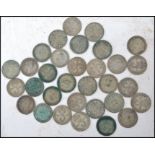 A collection of 31 silver three pence coins dating from the 19th century to include coins dating