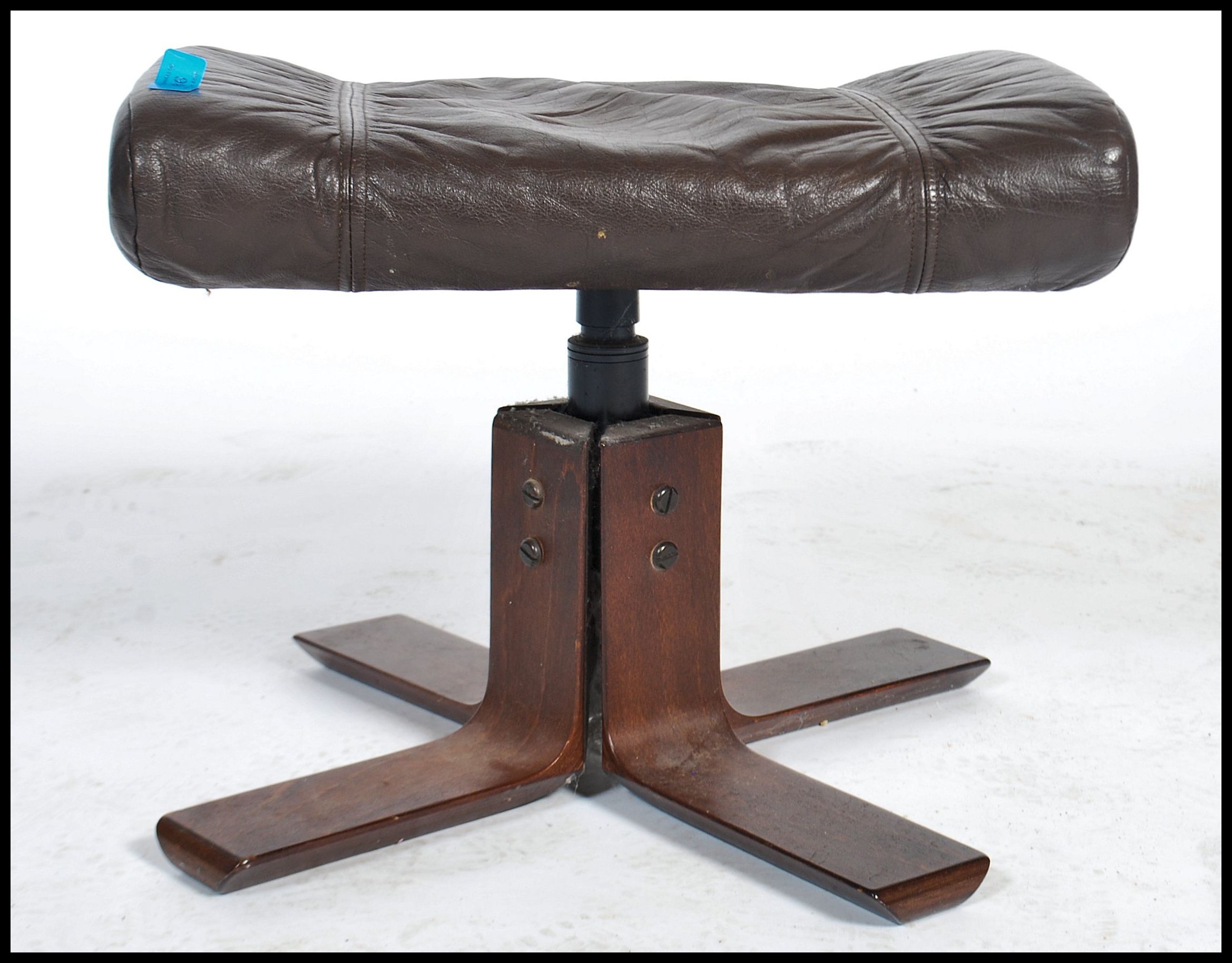 A 1970 Kebe leather footstool / ottoman on a wooden 4 point splayed base. Measures 38cms x 37cms x - Image 4 of 4