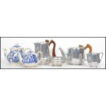 A retro 20th century Piquot Ware tea and coffee set consisting of teapot, coffee pot, creamer and
