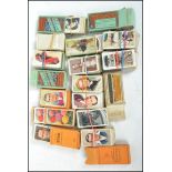 A collection of vintage cigarette cards to include Railway, Boxing Personalities, Dogs, The Reign of