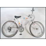 A retro 1980's Childs mountain bicycle  by Peuguot having 24" frame. The bike retaining good