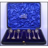 A cased set of silver hallmarked teaspoons and matching sugar nips complete in the presentation