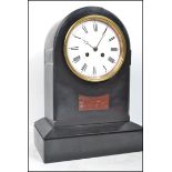 A Good Victorian large Slate mantel clock of spire shape. The large ceramic white dial with notation